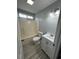 Bathroom featuring a tub, shower, vanity with storage, and modern fixtures at 9888 Conifer Ln., Murrells Inlet, SC 29576