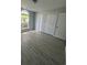 Bright bedroom with large closet, window and laminate flooring at 9888 Conifer Ln., Murrells Inlet, SC 29576
