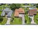 Aerial view of the home showcasing its layout, landscaping, and proximity to neighboring houses at 1008 Plantation Dr., Surfside Beach, SC 29575