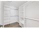Walk-in closet featuring modern organization system with shelving and hanging rods at 1008 Plantation Dr., Surfside Beach, SC 29575
