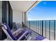 Relaxing balcony with comfortable lounge chairs and a stunning ocean view at 10200 Beach Club Dr. # 16F, Myrtle Beach, SC 29572