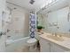 Inviting bathroom showcasing a shower and tub with a vanity and a toilet at 10200 Beach Club Dr. # 16F, Myrtle Beach, SC 29572