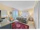 This bedroom with a plush bed and natural lighting offers an abundance of closet space for organized living at 10200 Beach Club Dr. # 16F, Myrtle Beach, SC 29572