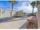 Outdoor shower and sitting area with bench offer convenience with nearby access to beachfront and palm tree views at 10200 Beach Club Dr. # 16F, Myrtle Beach, SC 29572
