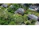 Aerial view of a home showcasing a private backyard pool, mature trees, and well-maintained landscaping at 1150 Waterway Dr., Myrtle Beach, SC 29572