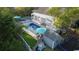 Aerial view of a backyard with a swimming pool, patio, and well-maintained landscaping at 1150 Waterway Dr., Myrtle Beach, SC 29572