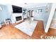 Spacious living room featuring a fireplace, hardwood flooring, and neutral wall paint at 1150 Waterway Dr., Myrtle Beach, SC 29572