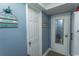 Hallway showing door and decorative wall art at 1207 S Ocean Blvd. # 20403, Myrtle Beach, SC 29577