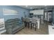 A charming living room with modern furnishings and a kitchen area at 1207 S Ocean Blvd. # 20403, Myrtle Beach, SC 29577