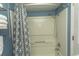 Shower and bathtub with shower curtain and adjustable shower head at 1207 S Ocean Blvd. # 20403, Myrtle Beach, SC 29577