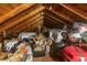 An attic provides vast potential for storage, or conversion to livable space with exposed wooden beams and easy access at 1217 S Highway 501, Marion, SC 29571