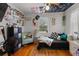Fun bedroom with hardwood floors, decorative walls, and lots of personality at 1217 S Highway 501, Marion, SC 29571