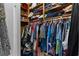Organized closet with clothes neatly arranged on hangers and shelves maximizes storage space, showcasing functionality and style at 1217 S Highway 501, Marion, SC 29571