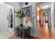 Inviting hallway showcases natural light and neutral tones, leading to other areas, enhanced by decor at 1217 S Highway 501, Marion, SC 29571