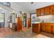 View from the kitchen into the breakfast nook and laundry area, with laminate floors at 1217 S Highway 501, Marion, SC 29571