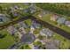 Community aerial view of perfectly manicured lawns, water features, and stately homes at 1323 Ashboro Ct., Myrtle Beach, SC 29579
