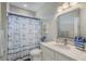 Well-lit bathroom with nautical decor, marble countertops, and a vanity at 1323 Ashboro Ct., Myrtle Beach, SC 29579