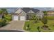 Charming brick home with a well-manicured lawn and two-car garage at 1323 Ashboro Ct., Myrtle Beach, SC 29579