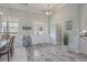 Bright foyer with natural light, decorative accents, and wood-look tile flooring at 1323 Ashboro Ct., Myrtle Beach, SC 29579