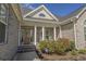 Inviting front porch featuring decorative columns and a welcoming entrance at 1323 Ashboro Ct., Myrtle Beach, SC 29579