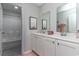 Bright bathroom featuring double vanity, neutral walls, and shower with bathtub at 1429 Nokota Dr., Conway, SC 29526