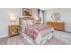 Well-lit bedroom with warm accents, decorative lamps, and comfortable furnishings at 1429 Nokota Dr., Conway, SC 29526