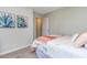 Cozy bedroom with soft decor, featuring nature-themed art and comfortable bedding at 1429 Nokota Dr., Conway, SC 29526