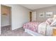 Relaxing bedroom with patterned bedding, neutral walls, and a walk-in closet at 1429 Nokota Dr., Conway, SC 29526