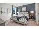 Cozy bedroom with a king-size bed, soft lighting, and a relaxing atmosphere, perfect for rest at 1429 Nokota Dr., Conway, SC 29526