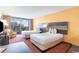 Comfortable bedroom offering two beds, an armchair, and a balcony with city views at 1501 S Ocean Blvd. # 805, Myrtle Beach, SC 29577