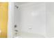 Clean, bright bathroom shower with white tile surround and updated fixtures at 1501 S Ocean Blvd. # 805, Myrtle Beach, SC 29577