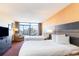 Bright bedroom with two beds and city views from the large sliding glass doors at 1501 S Ocean Blvd. # 915, Myrtle Beach, SC 29577