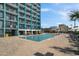 Enjoy the pool, with plenty of lounge chairs for sunbathing on a summer day at 1501 S Ocean Blvd. # 915, Myrtle Beach, SC 29577