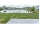 Expansive backyard with a picturesque lake view is perfect for recreation and enjoying nature at 1514 Saw Palmetto St., North Myrtle Beach, SC 29582