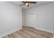 Bright bedroom features ceiling fan, hardwood flooring, and a double door closet at 1514 Saw Palmetto St., North Myrtle Beach, SC 29582