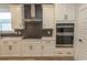 Modern kitchen features white cabinets, stone countertops, stainless appliances and subway tile backsplash at 1514 Saw Palmetto St., North Myrtle Beach, SC 29582