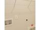 A close-up of the utility hookups in a laundry area with white shelving at 1514 Saw Palmetto St., North Myrtle Beach, SC 29582