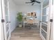 Warm, inviting office with stylish furniture, wood-look floors, and framed by glass doors at 1514 Saw Palmetto St., North Myrtle Beach, SC 29582