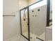 Modern shower with sleek, black trim and recessed shelving offers a spa-like experience at 1514 Saw Palmetto St., North Myrtle Beach, SC 29582