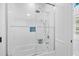 Clean bathroom with a tub and tiled shower featuring sliding glass doors at 155 Preservation Circle, Pawleys Island, SC 29585