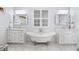 Elegant bathroom featuring a freestanding tub, double vanities, and marble countertops at 155 Preservation Circle, Pawleys Island, SC 29585