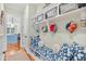 Inviting mudroom with built-in bench, storage, and stylish decor that combines functionality and aesthetic appeal at 155 Preservation Circle, Pawleys Island, SC 29585