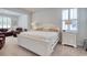 Bright bedroom featuring a comfortable bed, side tables, and ample natural light at 160 Juniata Loop, Little River, SC 29566