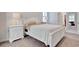 Cozy bedroom with a white bed frame, bedside tables, and ample natural light at 160 Juniata Loop, Little River, SC 29566