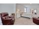 Relaxing bedroom featuring a comfortable bed, neutral colors, and ample lighting at 160 Juniata Loop, Little River, SC 29566
