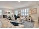 Open-concept living and dining area with natural light, cozy seating, and stylish decor at 160 Juniata Loop, Little River, SC 29566