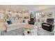 Spacious open-concept living area with modern kitchen and inviting seating arrangements at 160 Juniata Loop, Little River, SC 29566