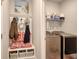 Mudroom with laundry machines, cubbies, and decorative wall hangings at 160 Juniata Loop, Little River, SC 29566