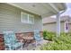 Cozy porch with seating, perfect for relaxing outdoors and enjoying the neighborhood views at 160 Juniata Loop, Little River, SC 29566