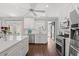 Bright open kitchen with stainless steel appliances, center island, and modern finishes at 1725 26Th Ave N, North Myrtle Beach, SC 29582